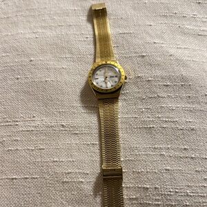 Timex Gold Timepiece with White Face